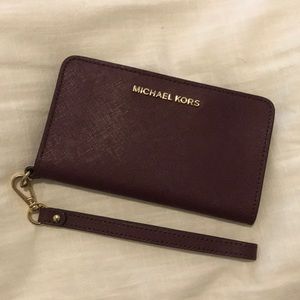 Michael Kors wristlet wallet with phone holder